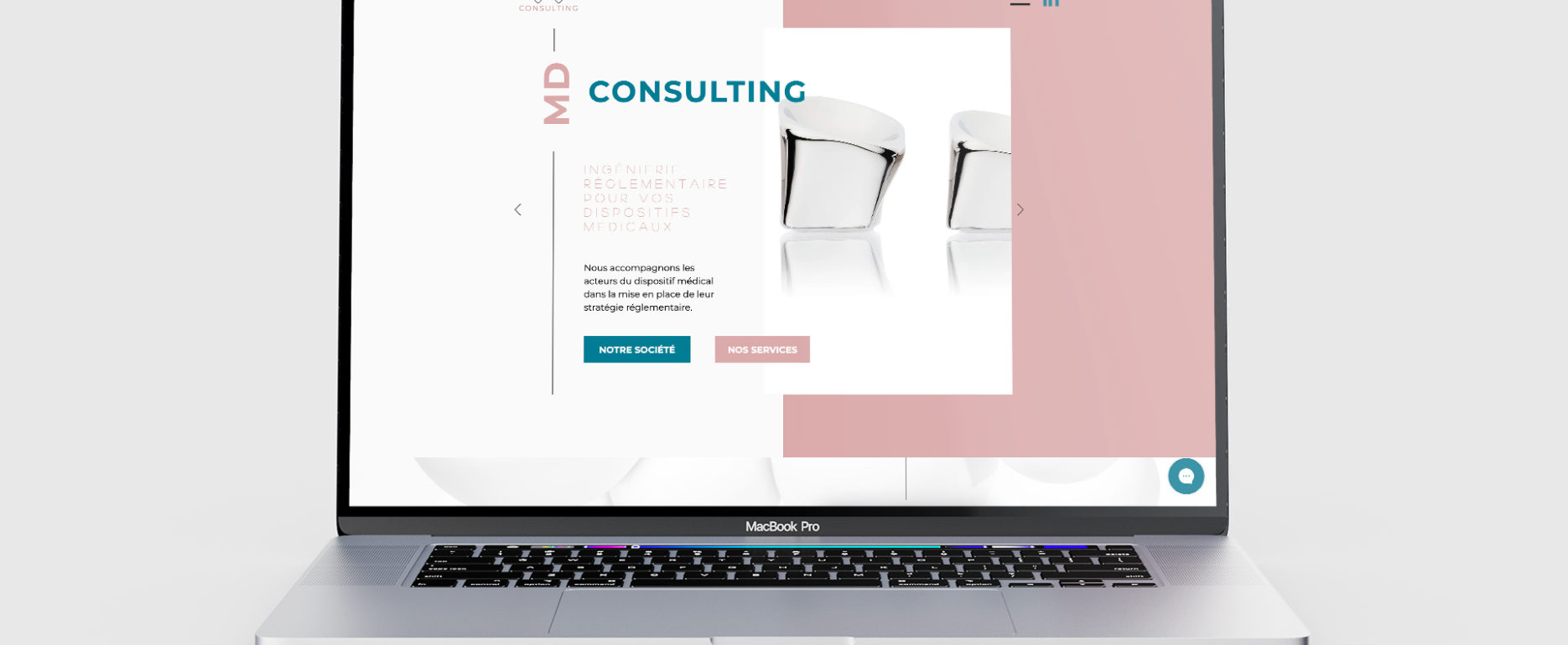 Macbook allumé avec la page internet du site de MD Consulting